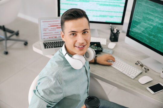 Portrait of male programmer in office
