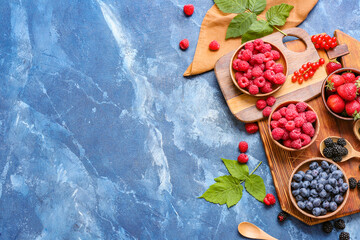 Tasty fresh berries on color background