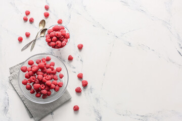 Tasty ripe raspberries on white background