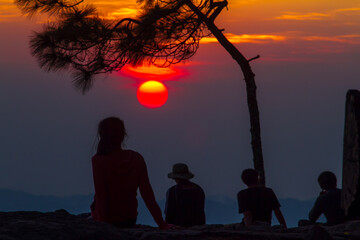 Fototapeta na wymiar silhouette of family at sunset