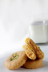 Milk peda is a traditional Indian sweet made from milk or khoya and garnished with pistachio to celebrate festivals like Diwali.