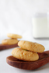 Milk peda is a traditional Indian sweet made from milk or khoya and garnished with pistachio to celebrate festivals like Diwali.