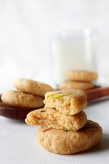 Milk peda is a traditional Indian sweet made from milk or khoya and garnished with pistachio to celebrate festivals like Diwali.