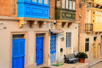 Fototapeta na wymiar Malta, old streets blue doors and balconies 
