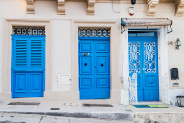 Obraz na płótnie Canvas Malta, old streets blue doors and balconies 