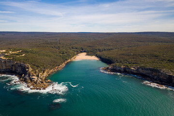 Aerial view of rugged coastline on a sunny bright day