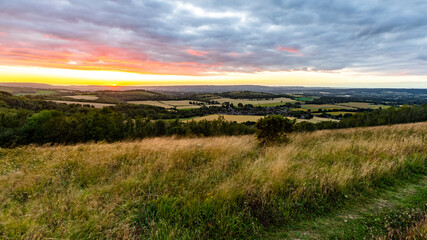 Fototapeta na wymiar sunset over the field from a hill top in south united kingdom