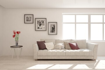 Fototapeta premium White stylish minimalist room with sofa. Scandinavian interior design. 3D illustration
