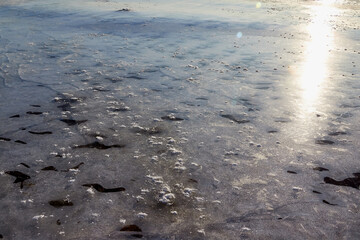 Sparkling ice texture or background. Ice hummock on Frozen River in winter sunny day.