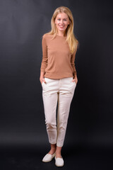 Portrait of happy beautiful woman with blond hair