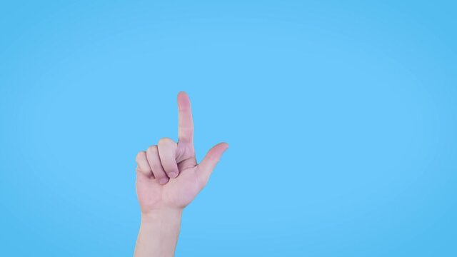 Hand gesture.Index finger pointing up, clarifying the way, demonstrating urgent news. Isolated on blue background. Sign and gesture language, pantomime concept.