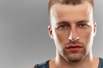 sport, fitness and people concept - portrait of young man