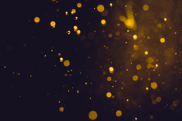 Dark Abstract Gold bokeh sparkle on black