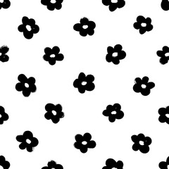 Fototapeta na wymiar Black abstract flowers vector seamless pattern. Botanical ink illustration with floral motif. Daisy or chamomile painted by brush. Hand drawn black print for fabric, wrapping paper, wallpaper design