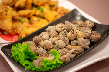Taiwan’s authentic national delicacy, salt-baked pepper snails