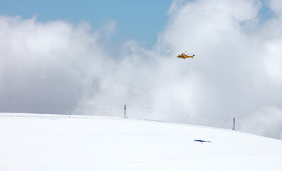 Naklejka na ściany i meble Yellow rescue helicopter