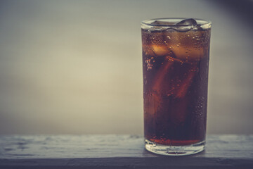 Cola with ice in the glass ready to drink for refresh