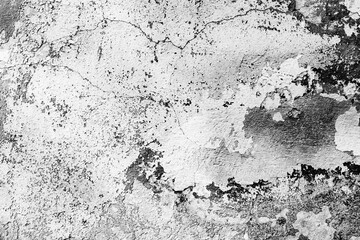 Texture of a concrete wall with cracks and scratches which can be used as a background
