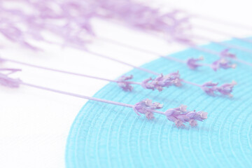 Laverder blue white tiny background of field flowers on aqua color jute and cloth