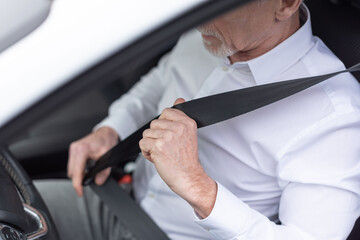 Fastening car seat belt