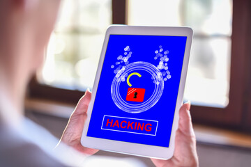 Hacking concept on a tablet