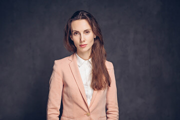 Concentrated caucasian woman on dark background