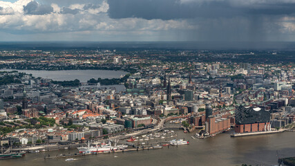 Fototapeta premium Aerial Hamburg Skyline with Rain Shower