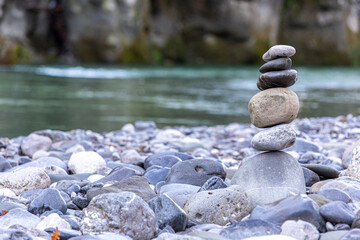 Fototapeta na wymiar Stack of stones, pebbles on the right side, relaxation picture and zen attitude