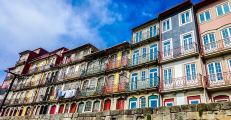 Bright colourful houses at Ribeira embankment (Cais da Ribeira). Porto, Portugal