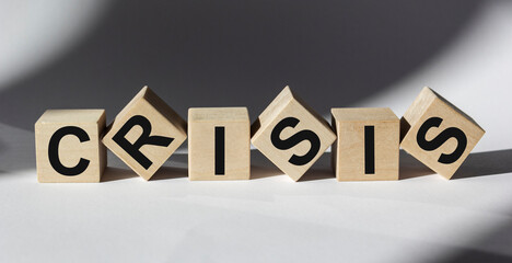 CRISIS Text Written On Wooden Blocks White Background Financial Market Concept