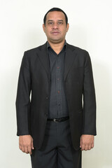 Fototapeta premium Portrait of overweight Indian businessman in suit