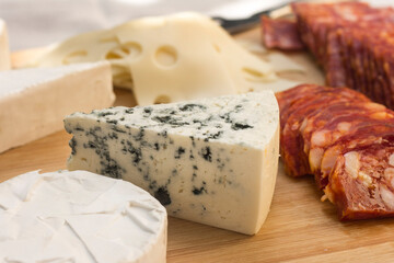 Choice of cheese appetizers at the table, close up