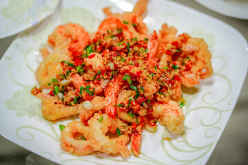 Shirmp and Squid with thai spicy sauce, Seafood pad prik klua in Thai language
