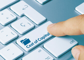 Fototapeta premium Cost of Capital - Inscription on Blue Keyboard Key.