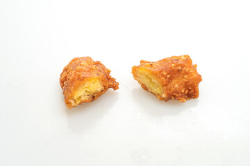 deep fried potatoes on white