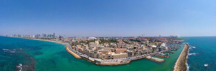 Aerial view of Jaffa old city port with marina coastline and general view of both Jaffa and Tel Aviv.
