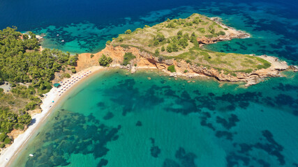 Aerial drone panoramic photo of paradise beaches in Kokinokastro with crystal clear turquoise sea, Alonissos island, Sporades, Greece 