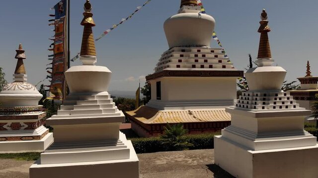 Ascending General Video of the Buddhist Temple of Dag Shang Kagyu in Spain with Its Main Stupa