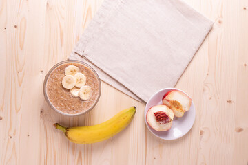 a portion of morning granola porridge served on rustic wooden surface