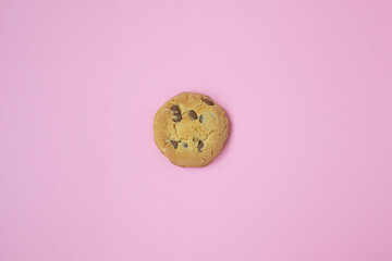chocolate cookies on a pink background