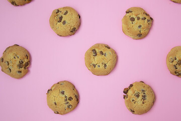 chocolate cookies on a pink background