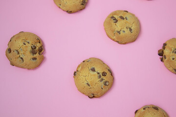 chocolate cookies on a pink background