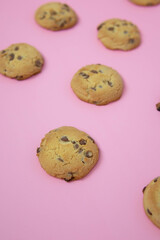 chocolate cookies on a pink background