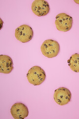 chocolate cookies on a pink background