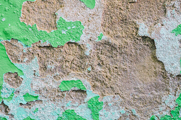 Old dirty painted wall. Several layers of peeling paint. background texture. Horizontal