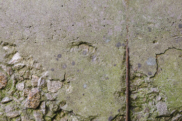 Old dirty concrete surface. Rusty fittings visible. background texture. Horizontal