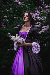 Lady in black and purple baroque dress