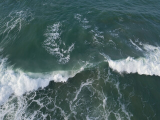 Aerial photo of a small surf break off the coast of New Zealand. 