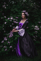 Fototapeta premium Lady in black and purple baroque dress