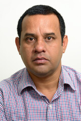 Fototapeta premium Portrait of overweight Indian businessman against white background